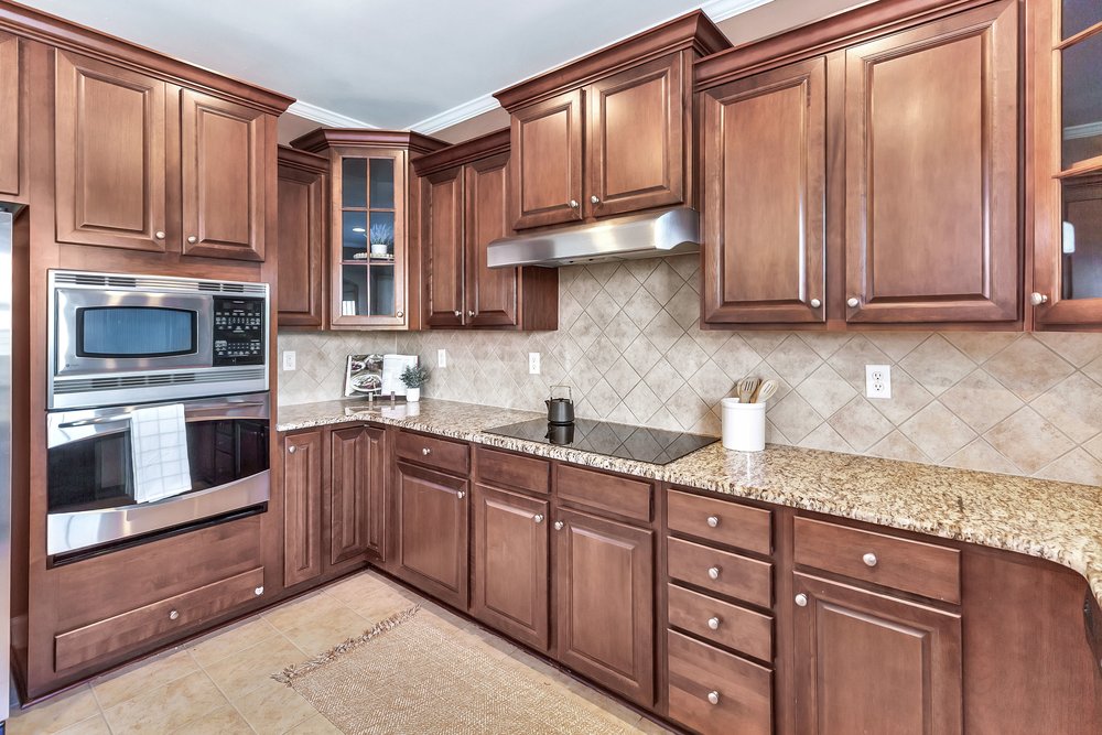 15 Fawn Hill Drive Anderson, SC 29621 - Photo 13 of 38 This spacious kitchen offers ample cabinet and counter space, perfect for culinary enthusiasts.
