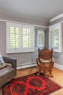 a room with toys and a wooden floor