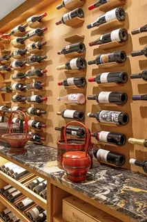 a stove top oven sitting inside of a kitchen