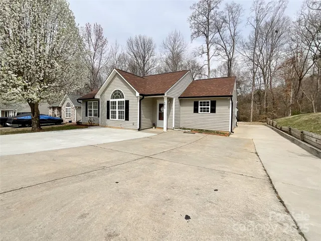 a house with trees in front of it