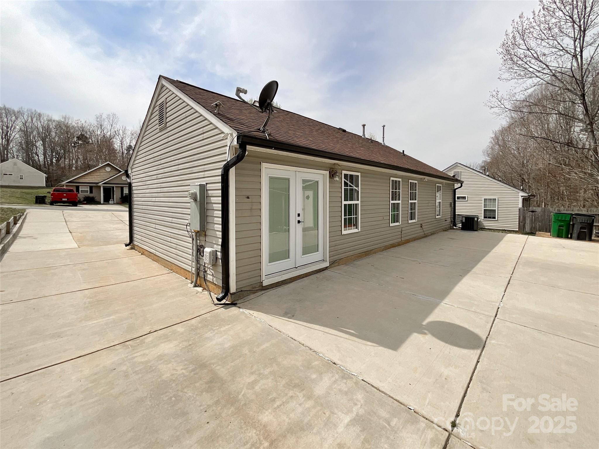 5610 Stone Bluff Court Charlotte, NC 28214 - Photo 35 of 41 a view of a house with a wooden fence