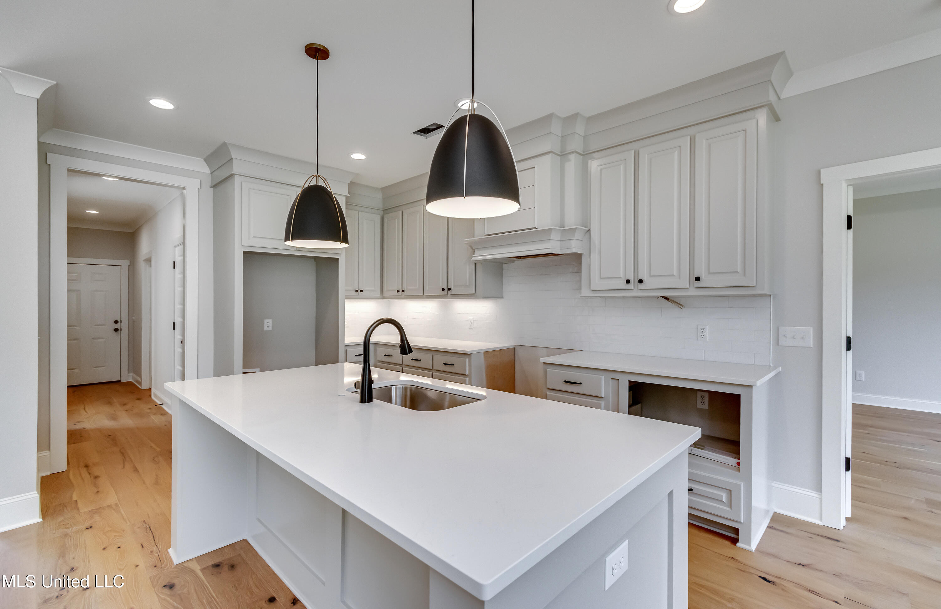 124 Grayson Way Madison, MS 39110 - Photo 19 of 49 Oversized Island with Bar Seating