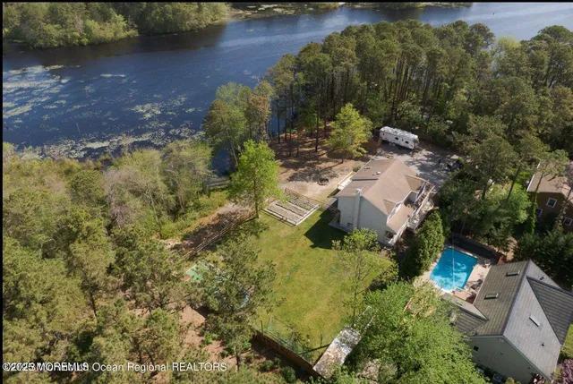 an aerial view of residential house with outdoor space