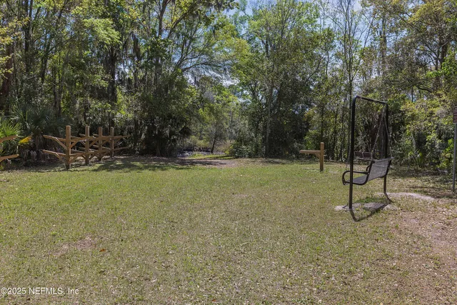 a view of backyard with outdoor space
