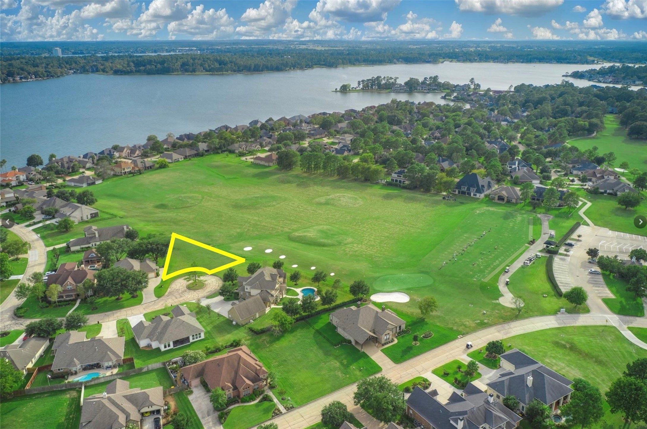 26 Naples Siding Montgomery, TX 77356 - Photo 3 of 8 a view of a lake with a big yard