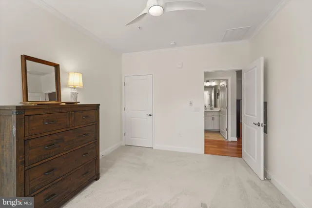 a view of room with cabinet and mirror