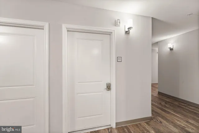 a view of a livingroom from a hallway