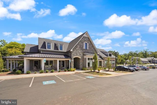 a front view of a building with a street