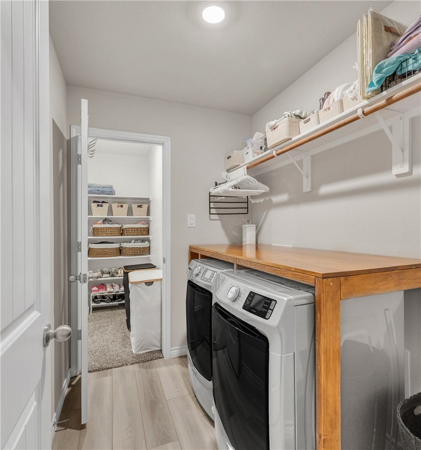 2016 Chief Street Bryan, TX 77807 - Photo 27 of 30 a kitchen with a stove and a refrigerator