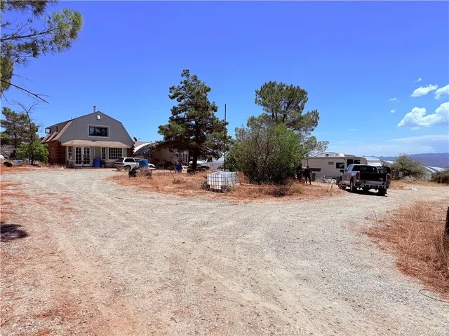 a view of a car parked in front of house