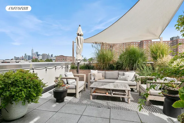 a open kitchen with a stove a sink and dishwasher