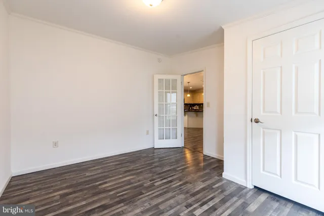 a view of wooden floor in an empty room