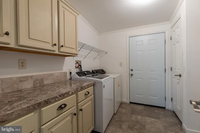a view of a kitchen with cabinets