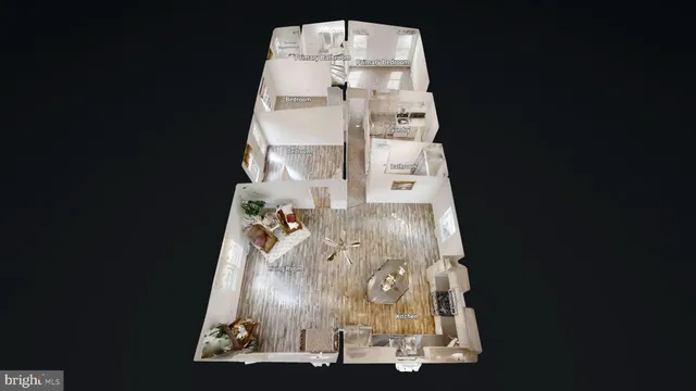 an aerial view of a house with outdoor space and trees