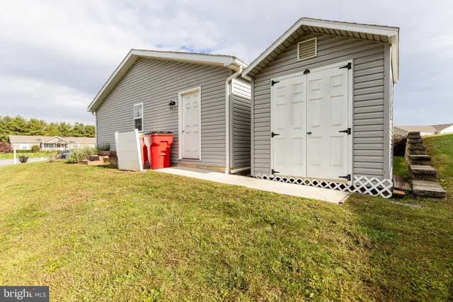 a front view of house with yard