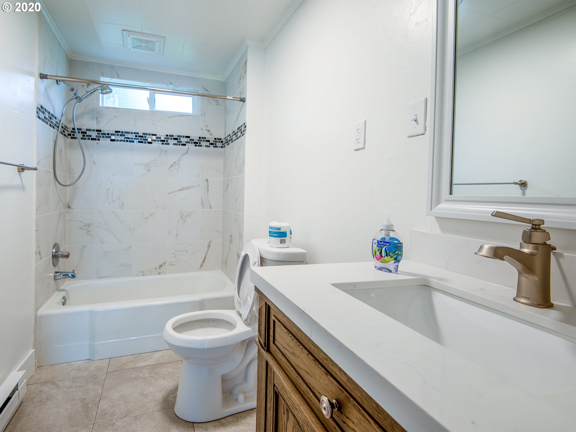 1037 Walnut Street Baker City, OR 97814 - Photo 7 of 14 a bathroom with a sink a toilet and a bathtub