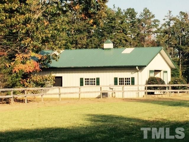 2730 Little River Church Road Hurdle Mills, NC 27541 - Photo 12 of 25 a front view of a house with yard