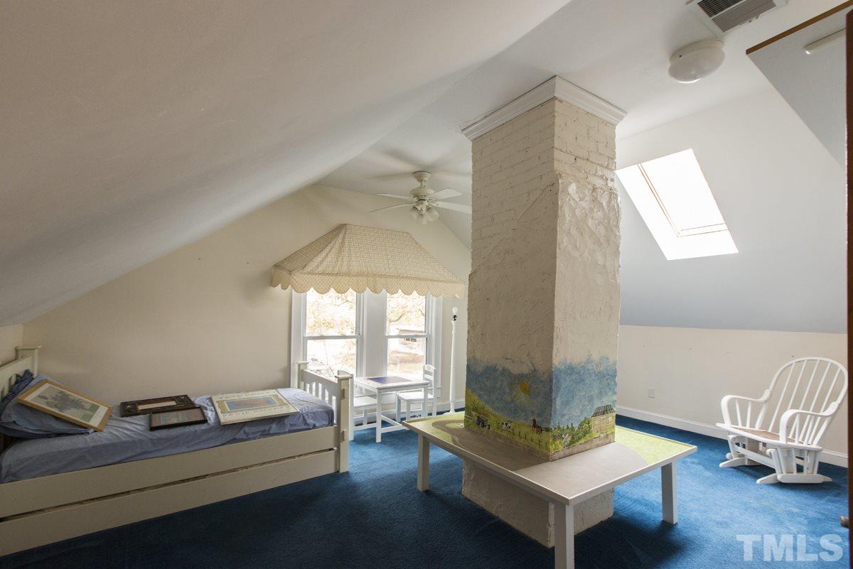 2730 Little River Church Road Hurdle Mills, NC 27541 - Photo 23 of 25 a living room with furniture and a window