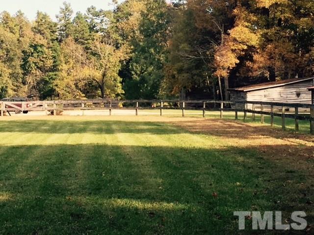 2730 Little River Church Road Hurdle Mills, NC 27541 - Photo 9 of 25 a view of a swimming pool with an outdoor space and seating area