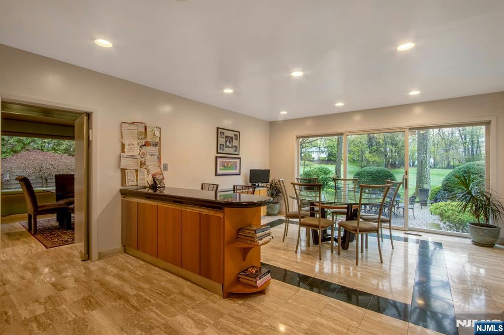 278 Fountain Road Englewood, NJ 07631 - Photo 12 of 37 a view of a dining room with furniture window and outside view