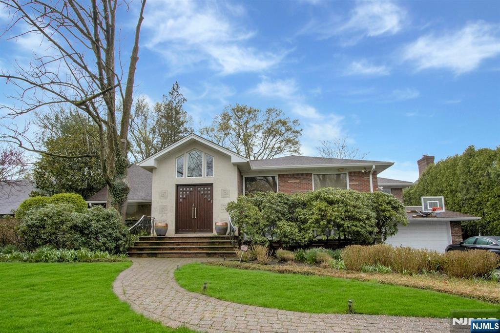 278 Fountain Road Englewood, NJ 07631 - Photo 2 of 37 front view of a house with a yard
