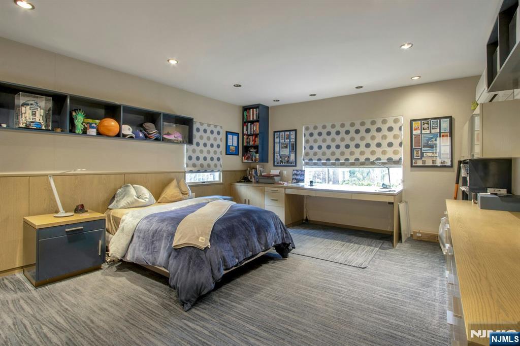 278 Fountain Road Englewood, NJ 07631 - Photo 28 of 37 a bedroom with a bed and a window