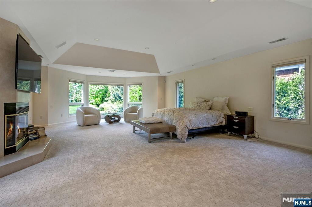 278 Fountain Road Englewood, NJ 07631 - Photo 31 of 37 a bedroom with furniture and a large window