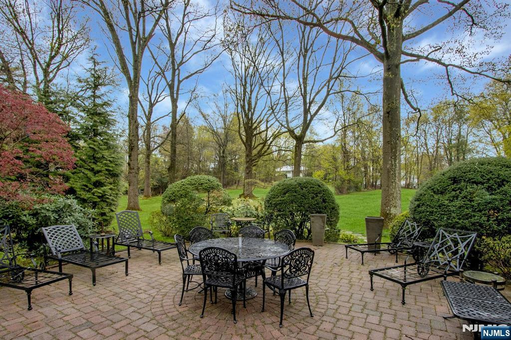 278 Fountain Road Englewood, NJ 07631 - Photo 35 of 37 a view of a tables and chairs in a patio