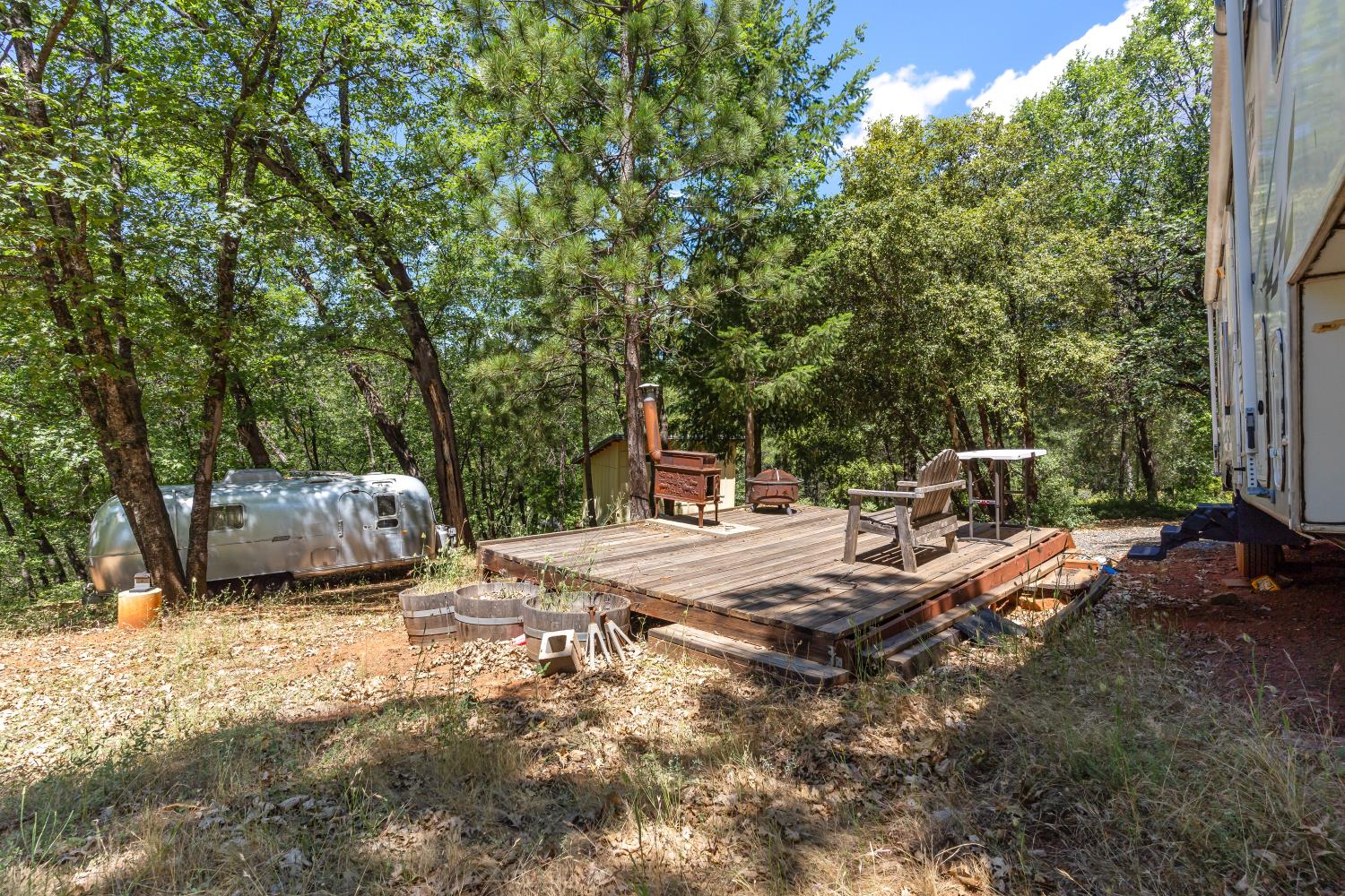 2640 Trail Gulch Road Placerville, CA 95667 - Photo 16 of 37 a view of a backyard with sitting area