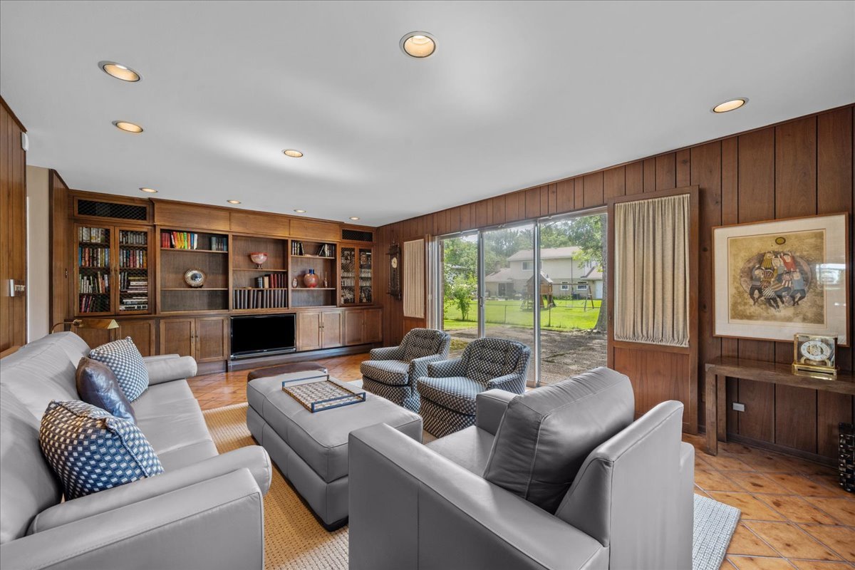 49 Larkdale E Road Deerfield, IL 60015 - Photo 6 of 24 a living room with furniture and a large window