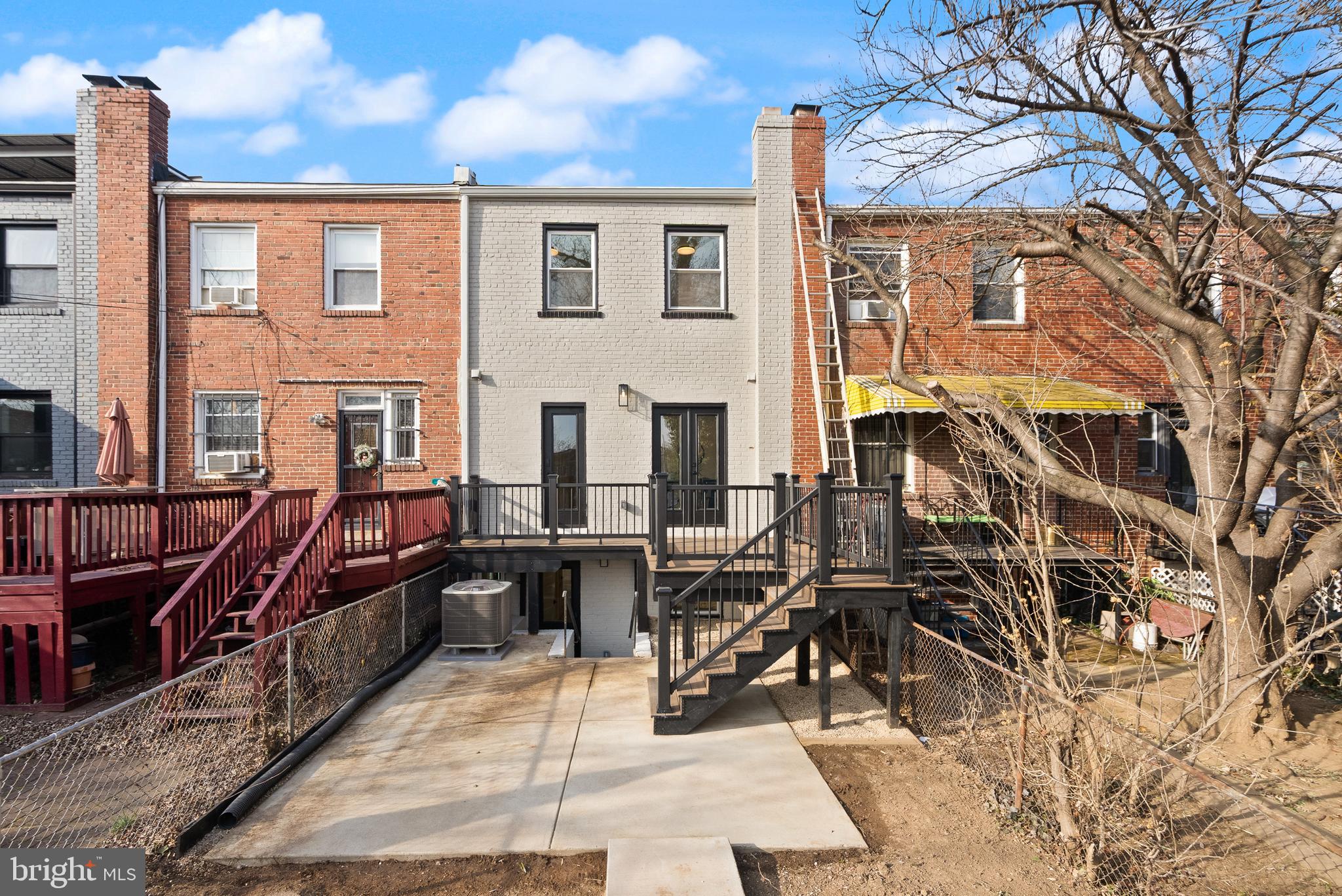 321 16th Street Northeast Washington, DC 20002 - Photo 5 of 9 a view of a brick house with many windows