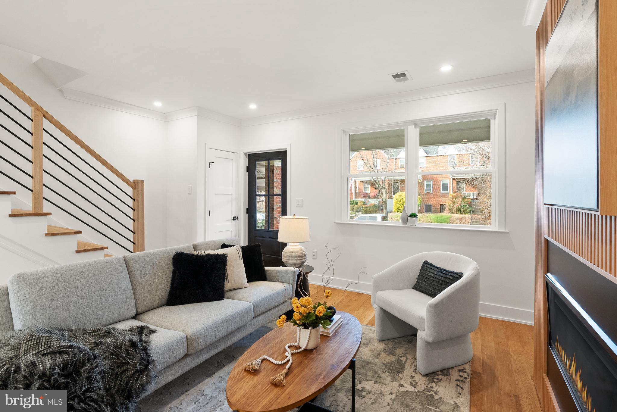 321 16th Street Northeast Washington, DC 20002 - Photo 7 of 46 a living room with furniture and a large window