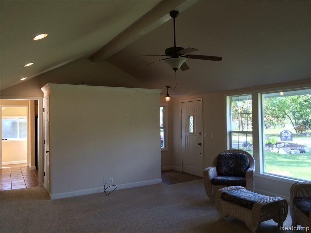 5611 Delmas Road Clarkston, MI 48348 - Photo 3 of 10 Living Room with Vaulted Ceiling