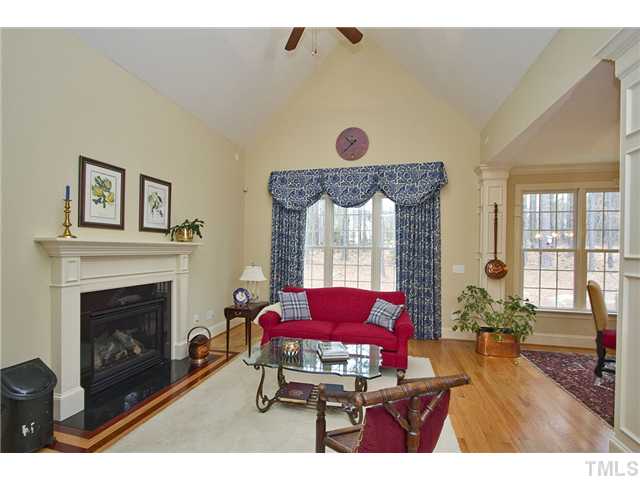 1004 Widgeon Way Raleigh, NC 27603 - Photo 14 of 25 Very warm and welcoming family/hearth room right off of the kitchen. Note second fireplace with gas logs.