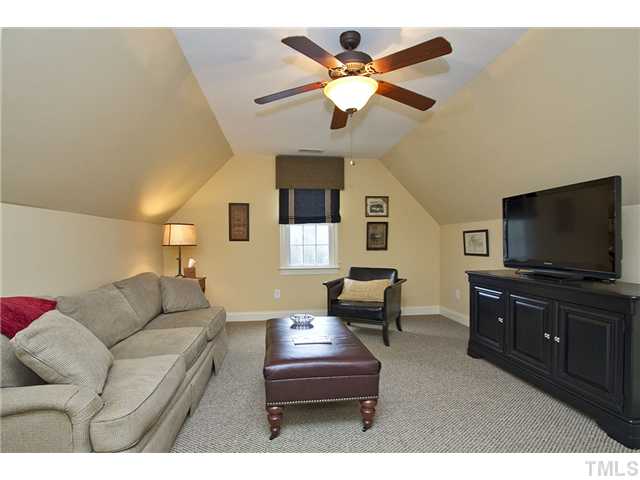 1004 Widgeon Way Raleigh, NC 27603 - Photo 23 of 25 Comfy bonus room with spacious closet could be a 4th bedroom.
