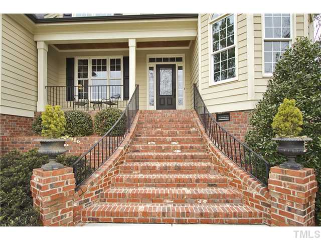 Impressive brick and wrought iron staircase.