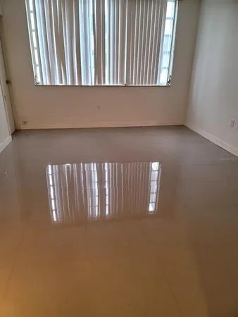 a view of a windows and an empty room