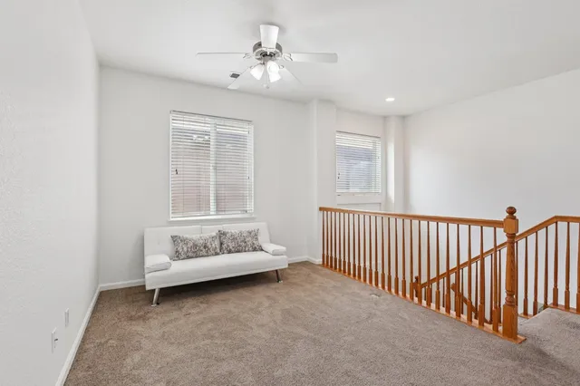 a living room with furniture and window