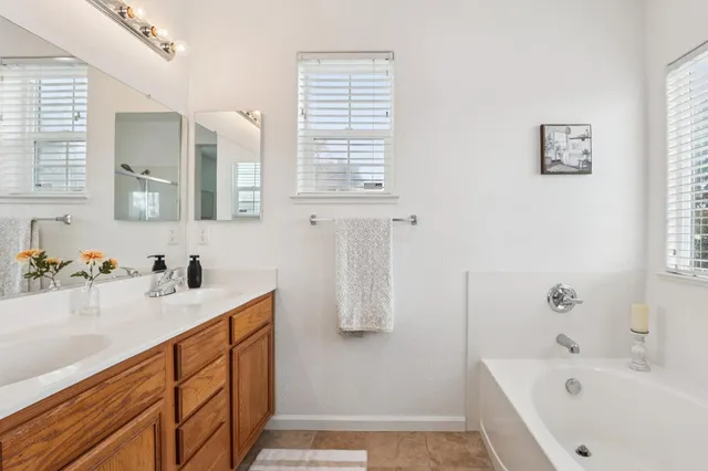 a bathroom with a sink and a bathtub