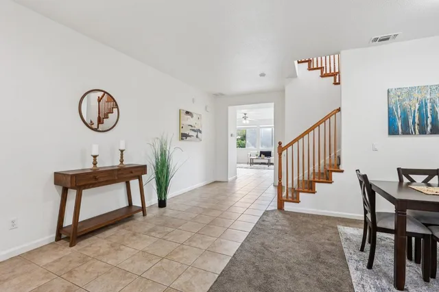 a view of a hallway with seating area