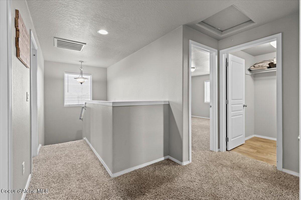 1020 West Jenicek Loop Post Falls, ID 83854 - Photo 26 of 67 Upstairs Hallway
