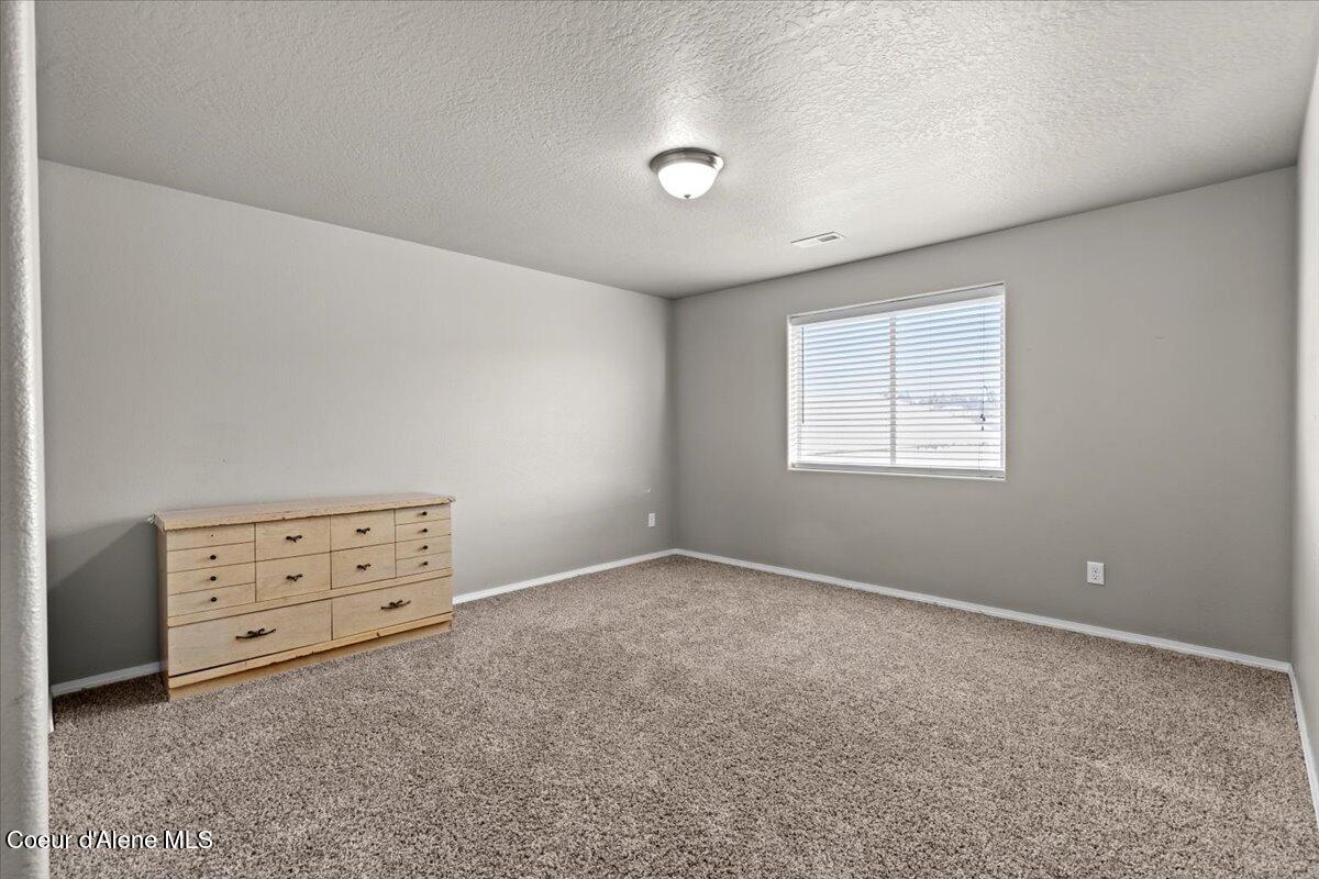 1020 West Jenicek Loop Post Falls, ID 83854 - Photo 33 of 67 Large Upstairs BEdroom