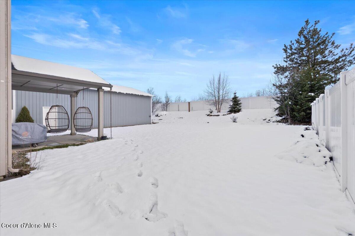 1020 West Jenicek Loop Post Falls, ID 83854 - Photo 47 of 67 Lots of Grass Under the Snow