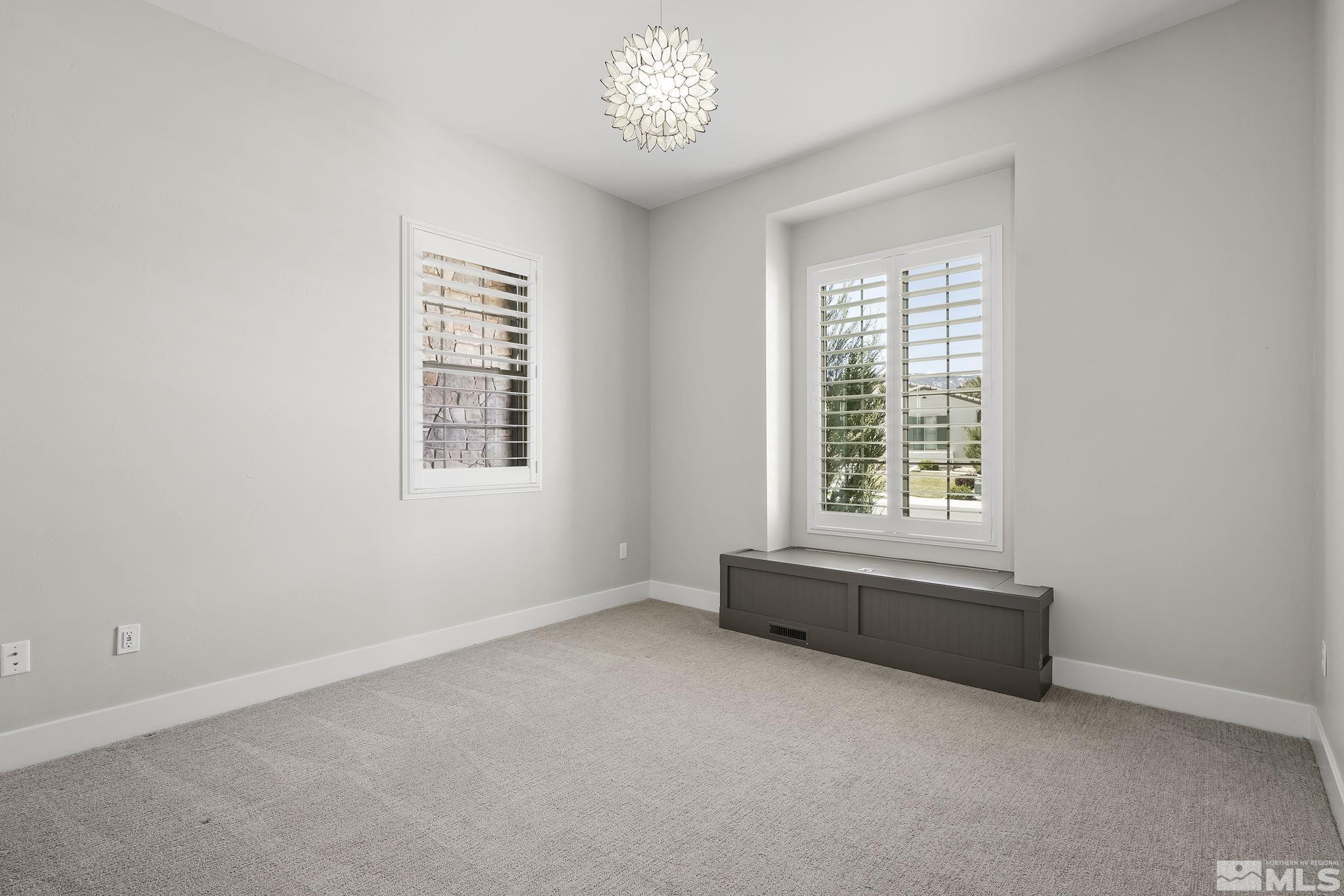 13326 Travertine Lane Reno, NV 89511 - Photo 21 of 36 an empty room with a window