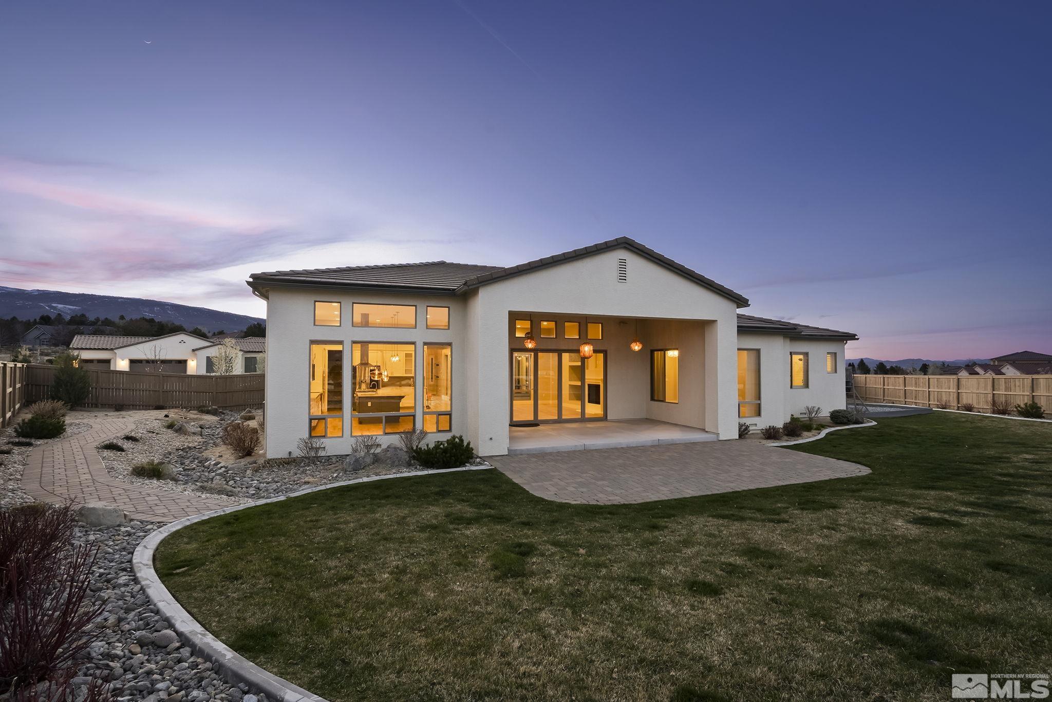 13326 Travertine Lane Reno, NV 89511 - Photo 29 of 36 a front view of a house with a yard