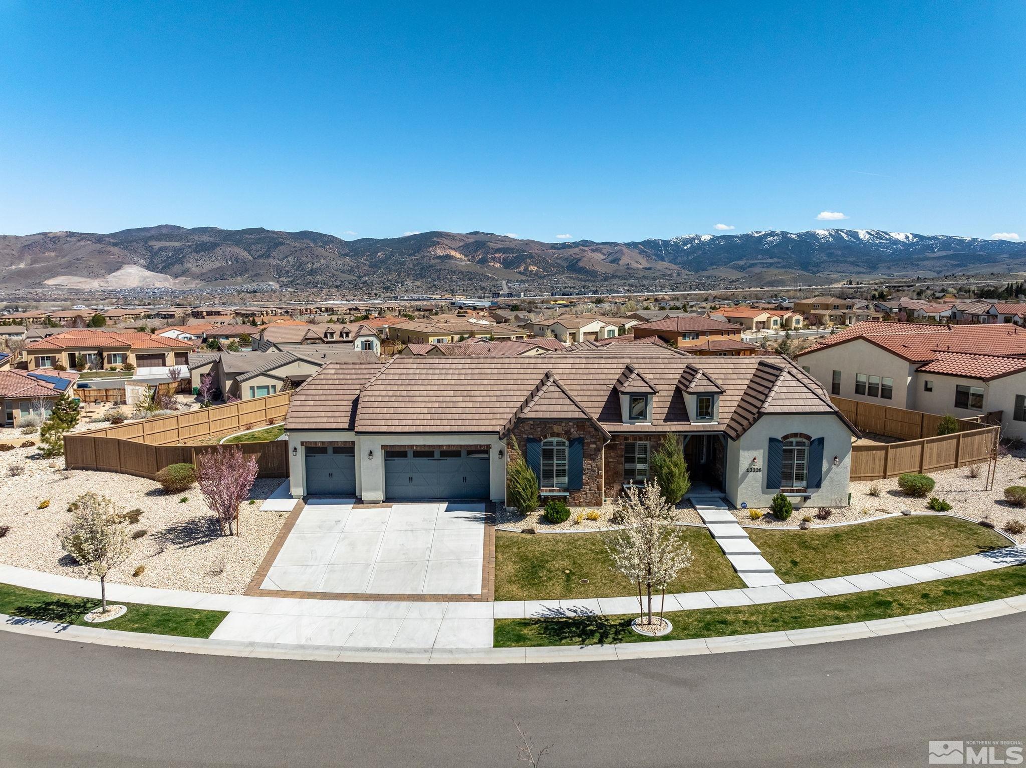 13326 Travertine Lane Reno, NV 89511 - Photo 33 of 36 a view of a city with tall buildings