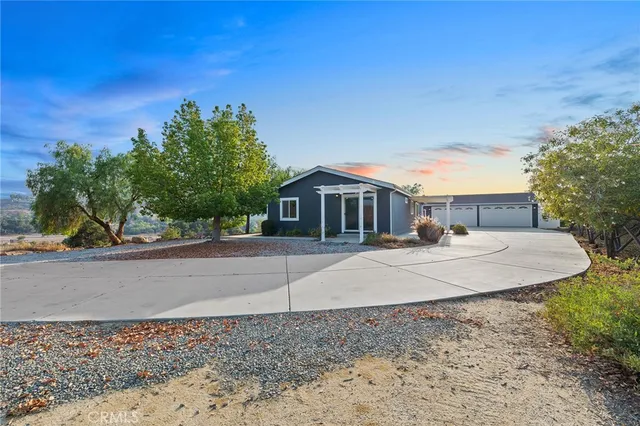 a backyard of a house with seating space