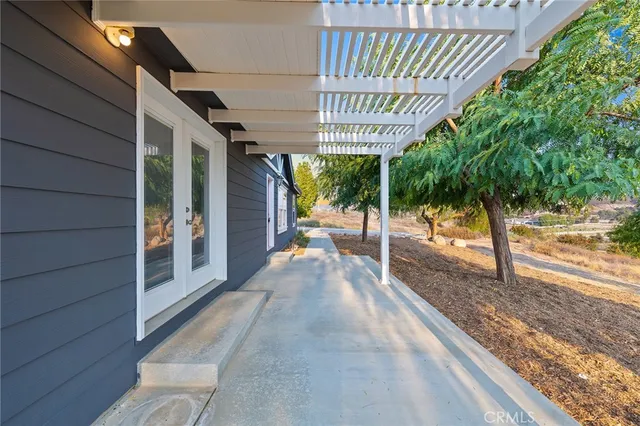 a view of a street with a building in the background