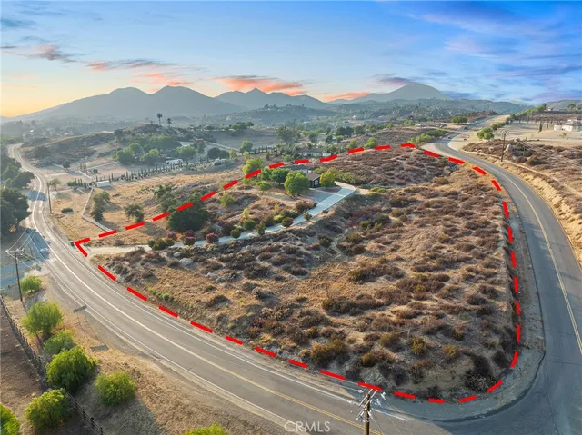 an aerial view of a house with a lake view