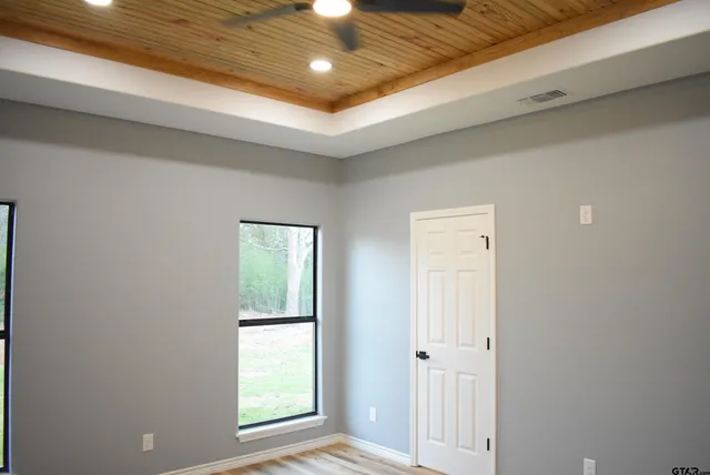 a view of an empty room and window